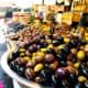 Bowls of fresh olives at an open air market